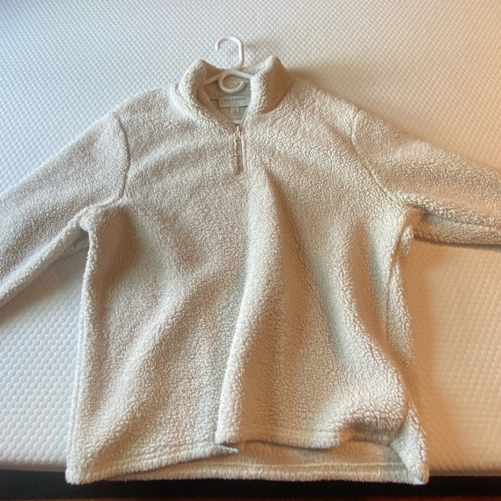 White fuzzy sweater